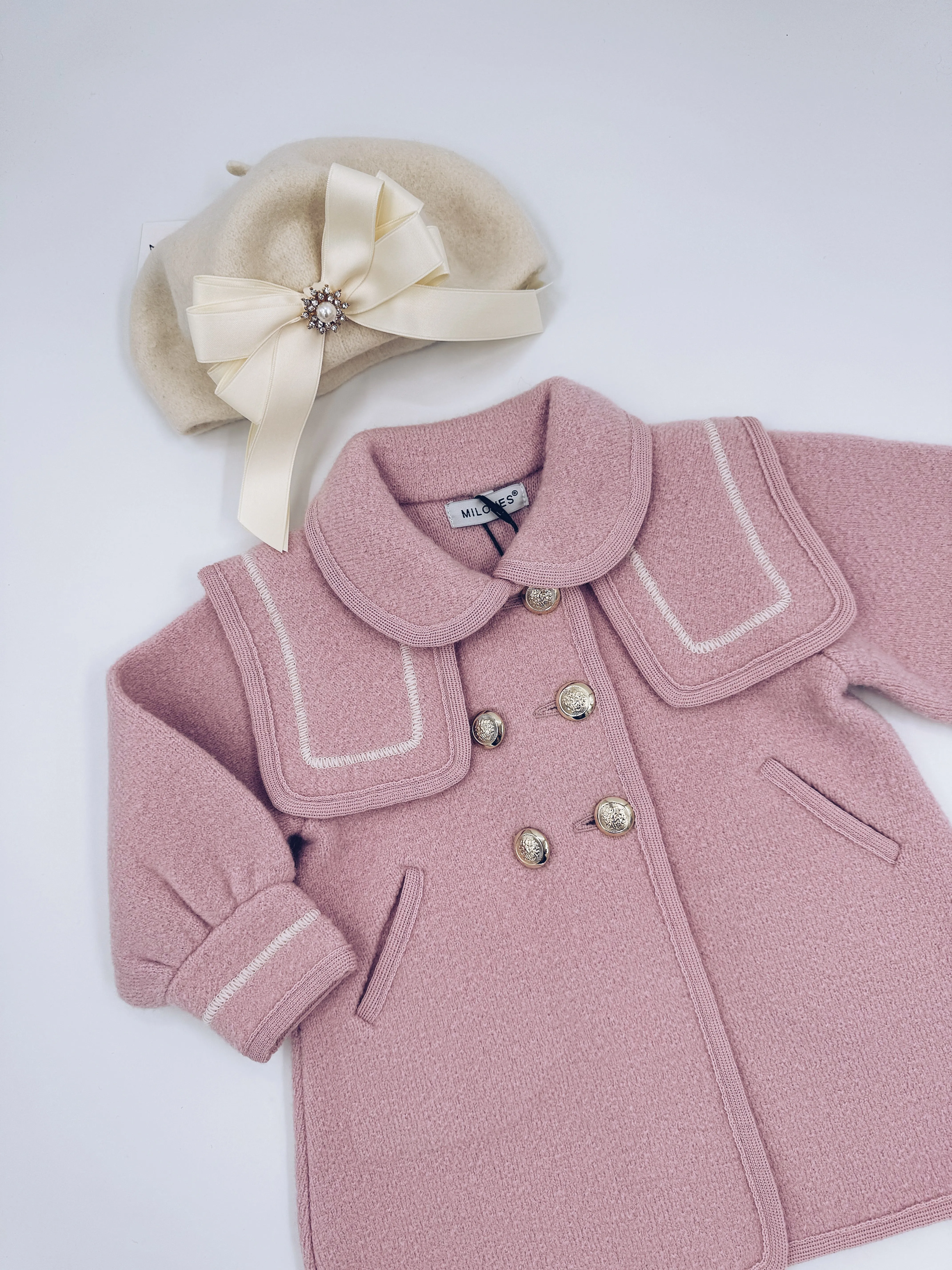 Beautiful pink merino wool coat with Cream stitching details