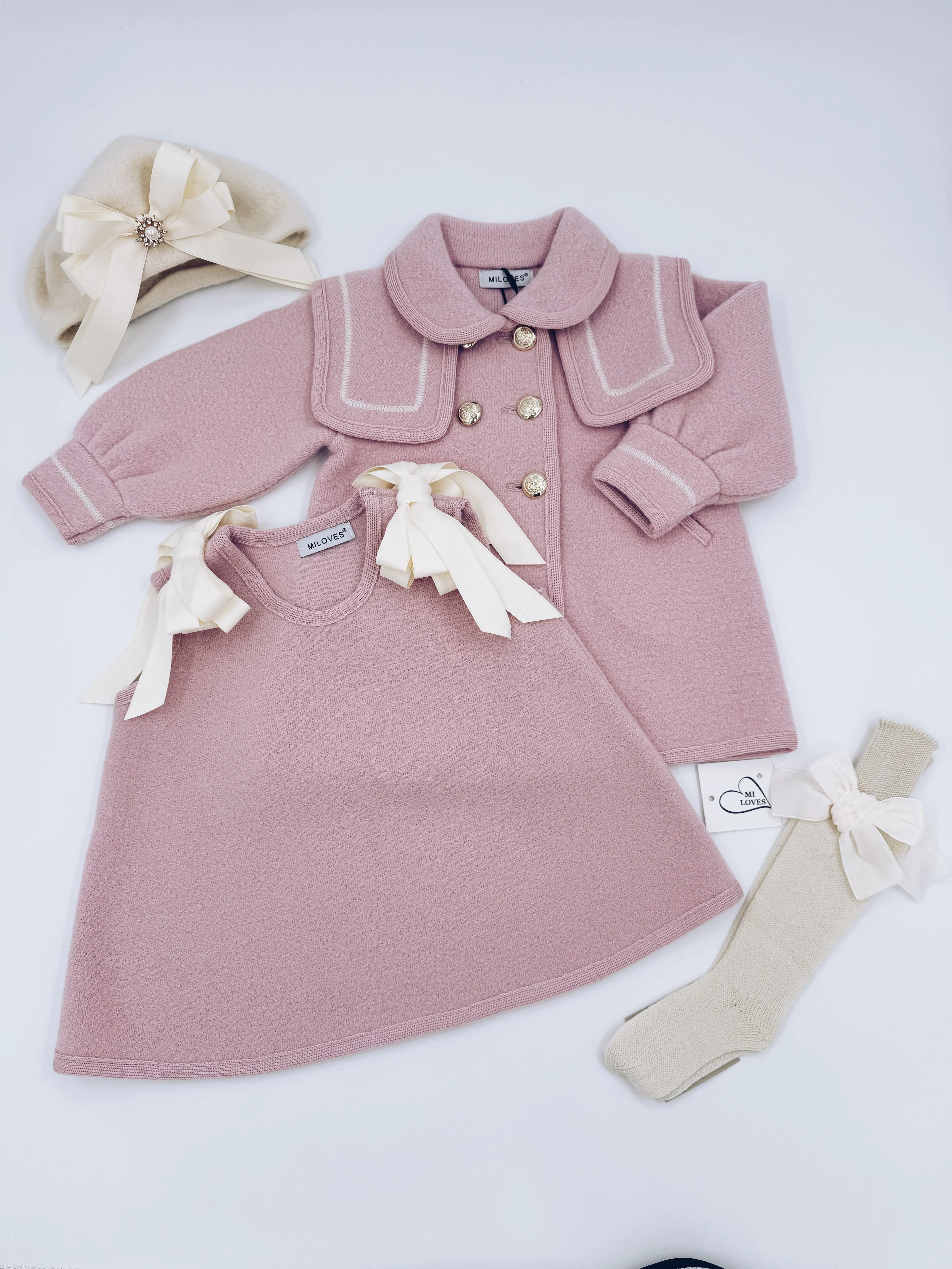 Beautiful pink merino wool coat with Cream stitching details