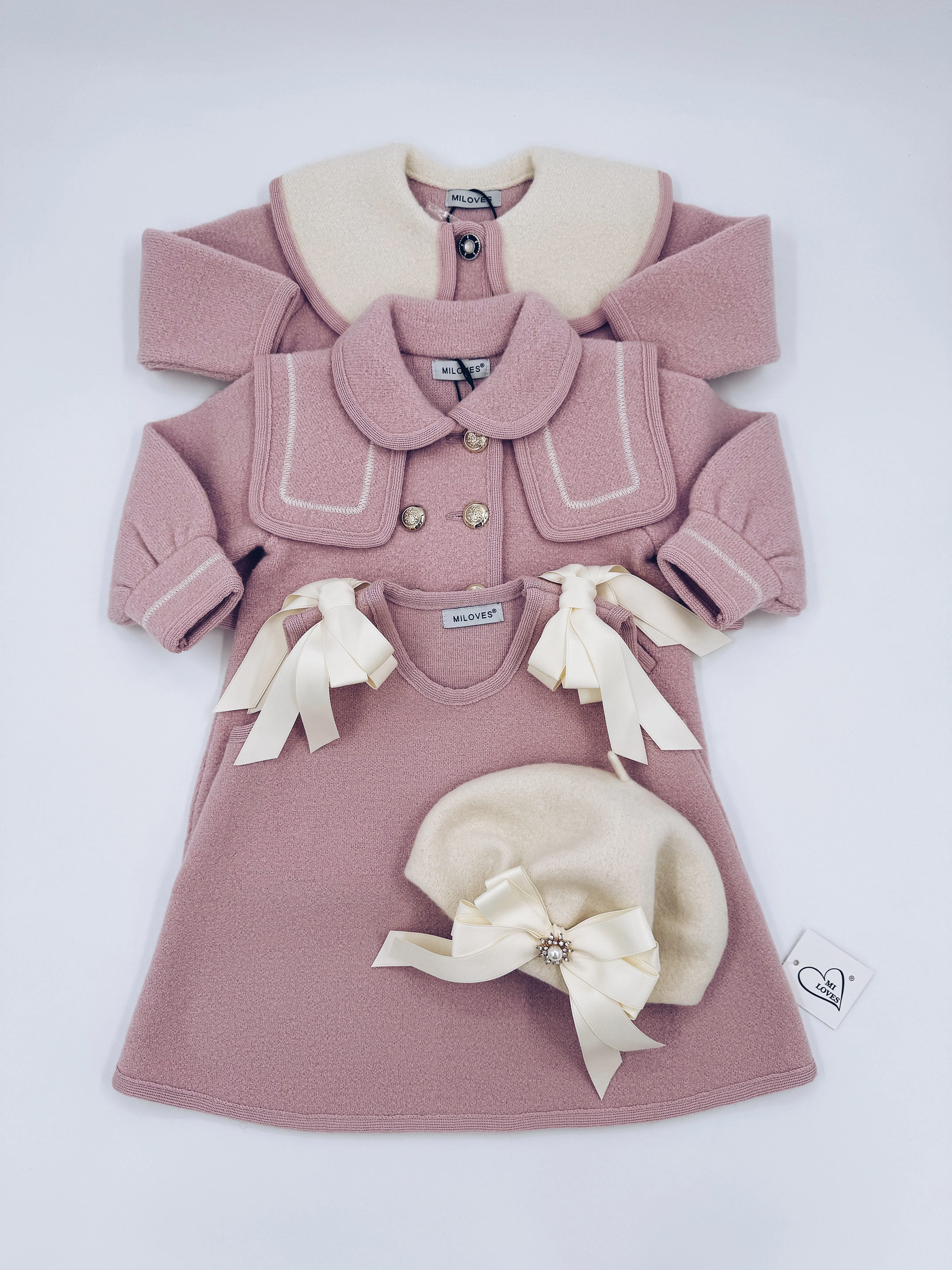 Beautiful pink merino wool coat with Cream stitching details