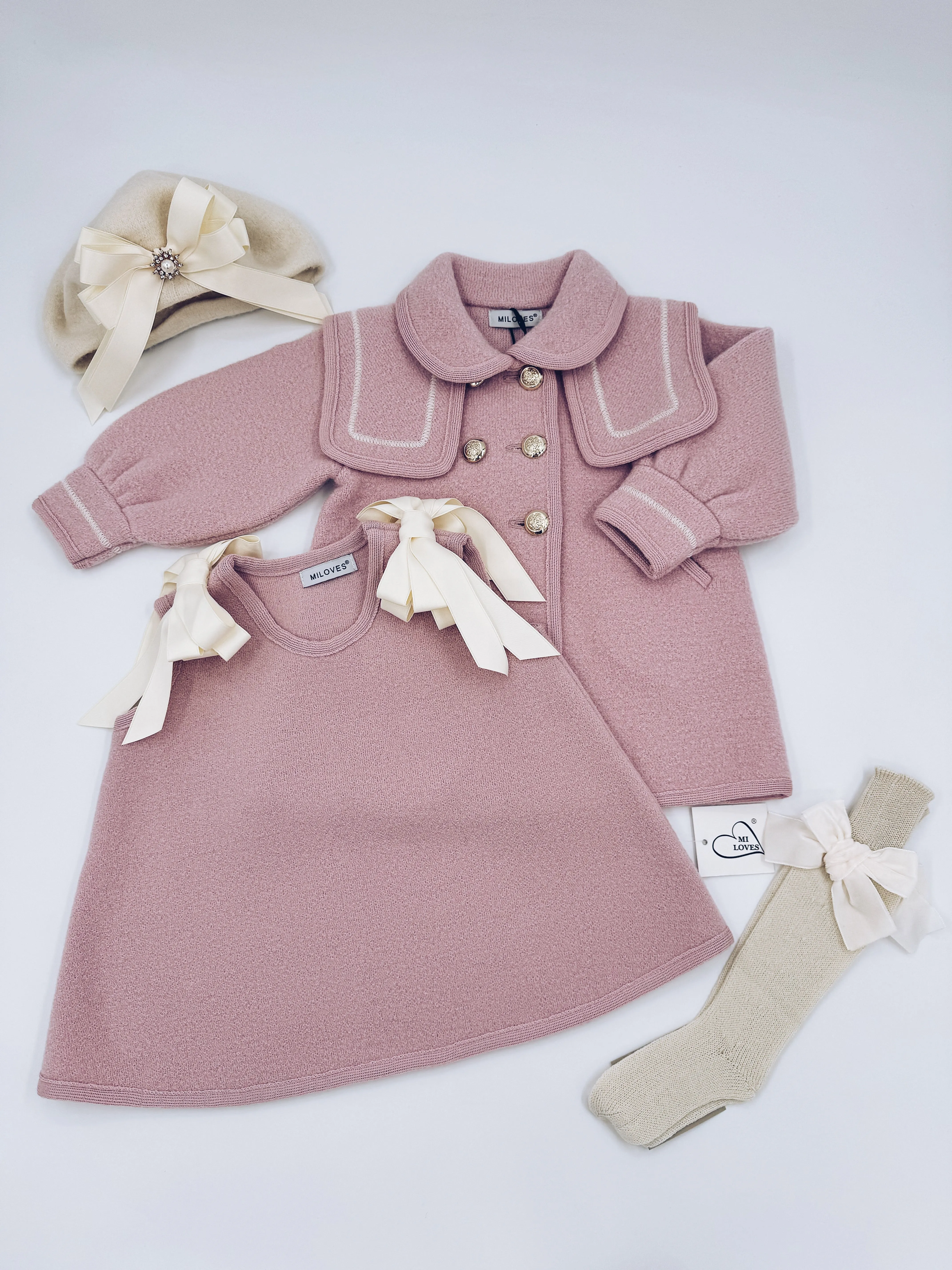 Beautiful pink merino wool coat with Cream stitching details