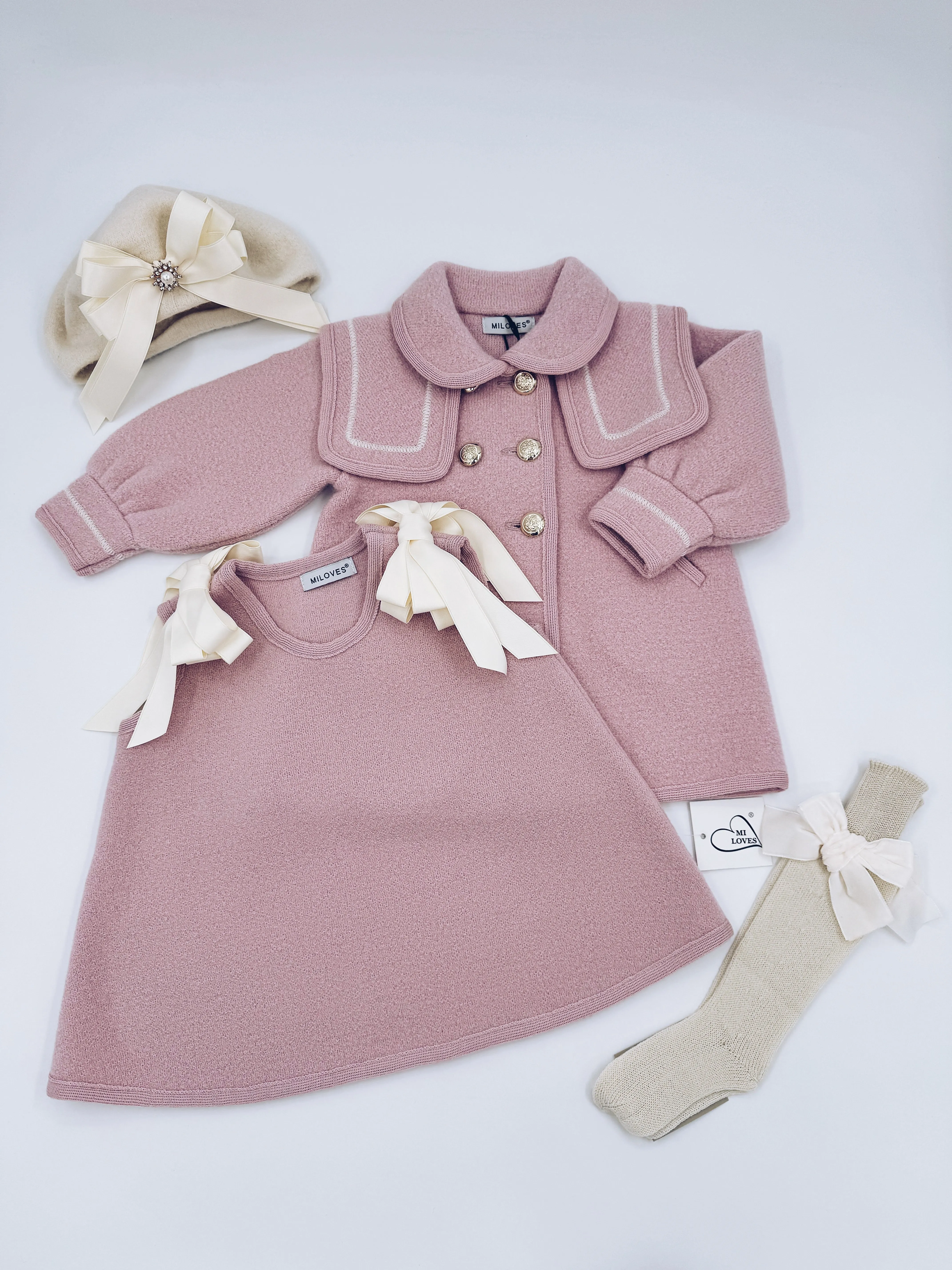 Beautiful pink merino wool coat with Cream stitching details
