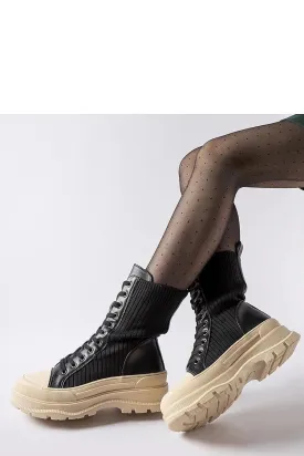 Black sock boots with a light sole